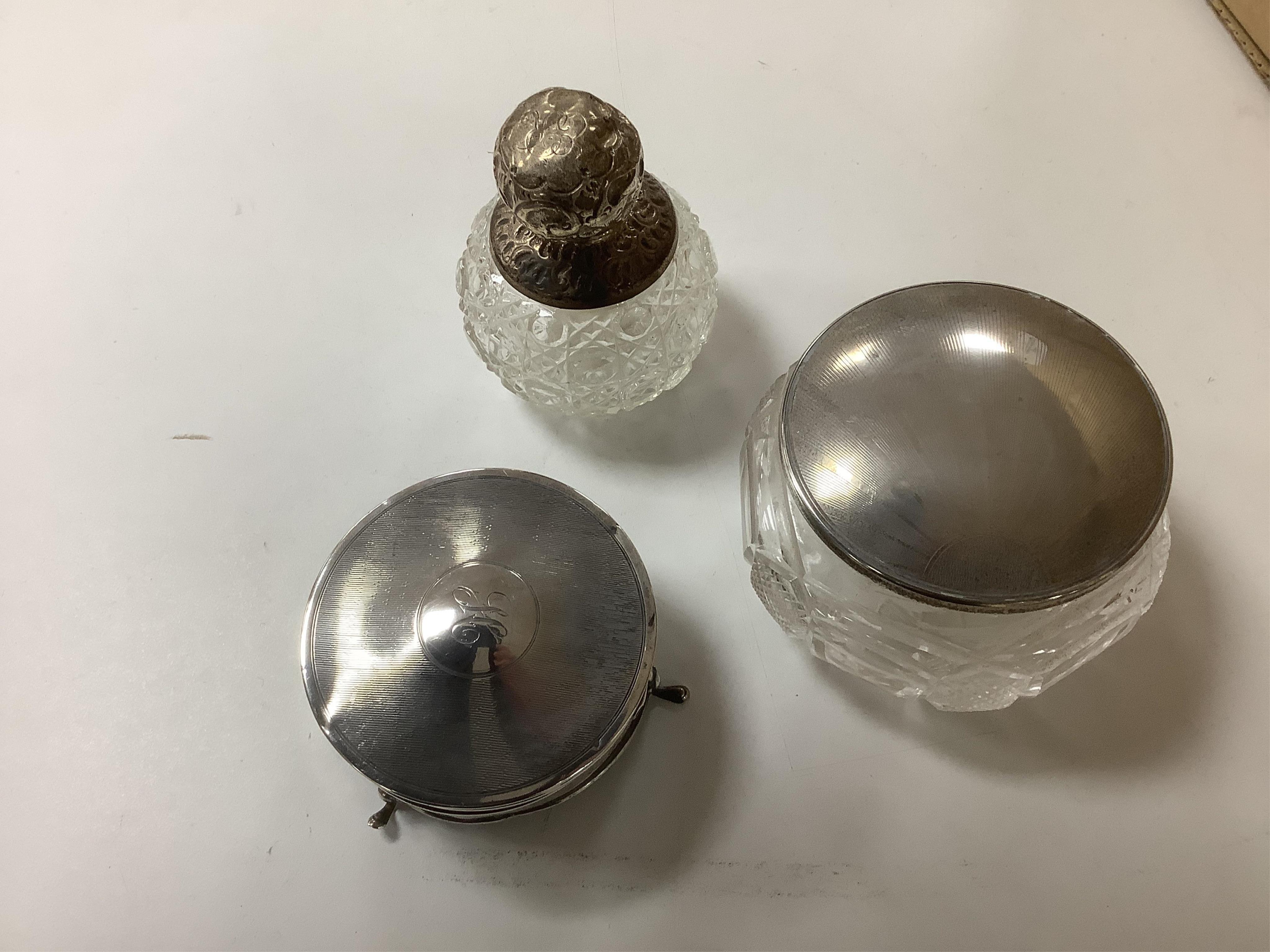 A group of assorted plated ware, including a pair of candlesticks, a salver, toast rack and cutlery including set of mother of pearl handled dessert eaters, together with a George V silver mounted trinket box and two sil